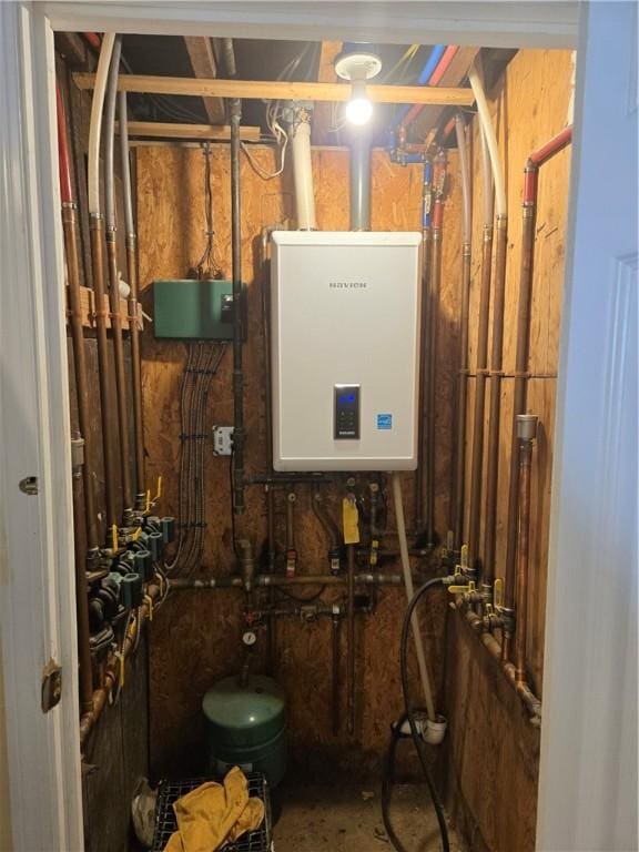45 Harrison St, Pawtucket, RI 02860 - utility room featuring water heater