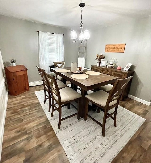 8 Orchard St, West Warwick, RI 02893 - dining space featuring wood finished floors, a chandelier, and baseboard heating