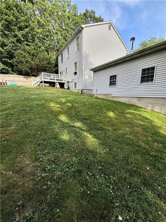 8 Orchard St, West Warwick, RI 02893 - view of side of property featuring a deck