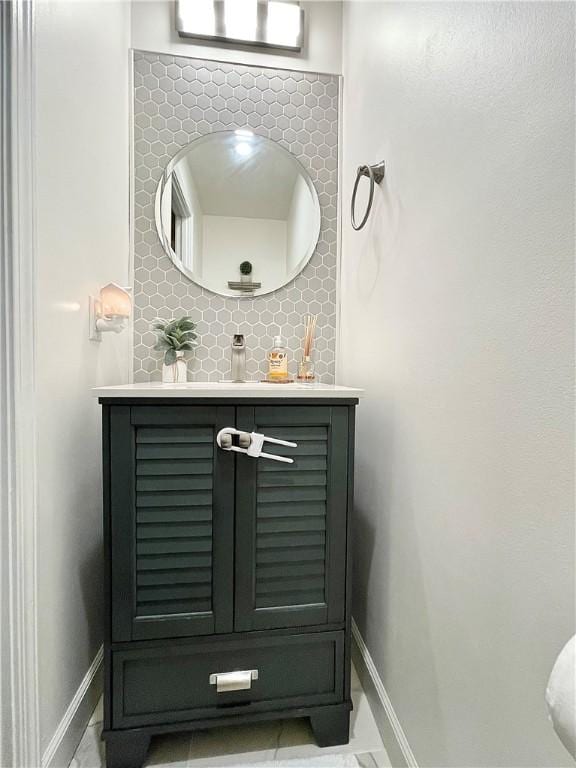 8 Orchard St, West Warwick, RI 02893 - bathroom with baseboards and vanity
