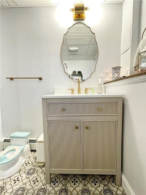 8 Orchard St, West Warwick, RI 02893 - half bathroom with vanity and baseboard heating