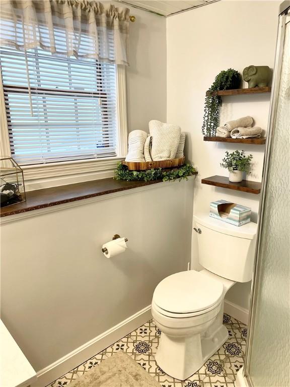 8 Orchard St, West Warwick, RI 02893 - bathroom with tile patterned flooring