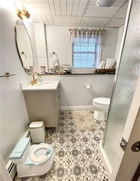 8 Orchard St, West Warwick, RI 02893 - bathroom featuring vanity, a shower stall, tile patterned floors, baseboard heating, and wood ceiling