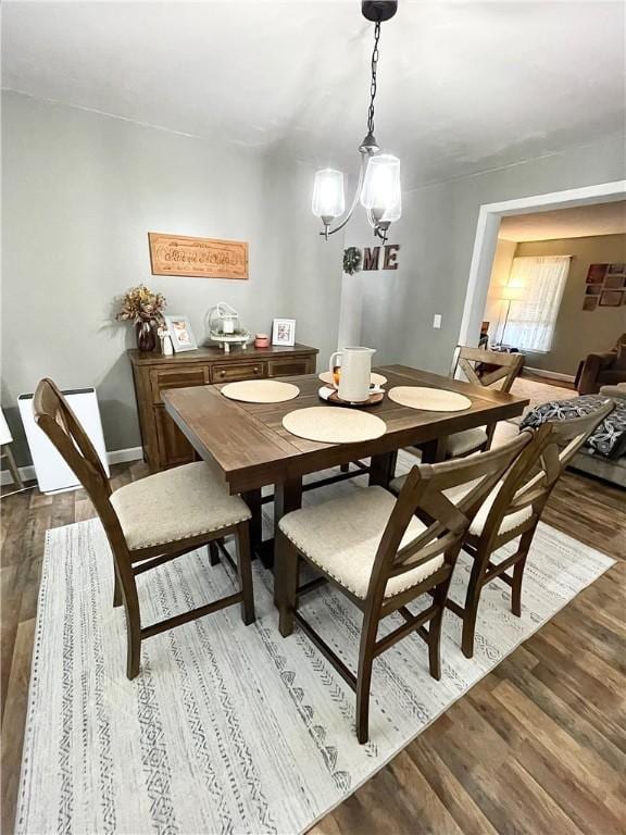 8 Orchard St, West Warwick, RI 02893 - dining room featuring wood finished floors and a chandelier