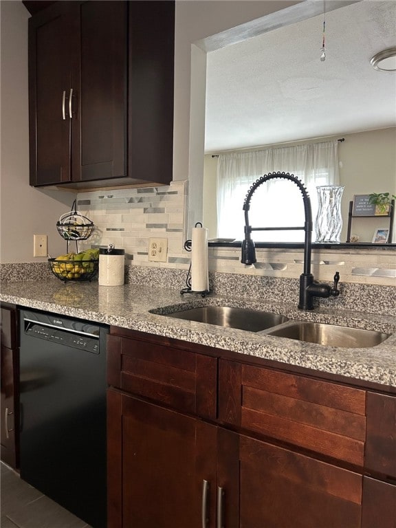 565 Quaker Ln Unit 101, West Warwick, RI 02893 - kitchen with dishwasher, light stone countertops, decorative backsplash, and dark brown cabinetry