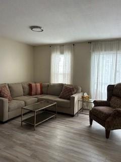 565 Quaker Ln Unit 101, West Warwick, RI 02893 - living area featuring wood finished floors