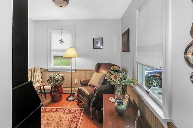 60 Tower Hill Rd, Tiverton, RI 02878 - sitting room featuring wood finished floors and a wainscoted wall