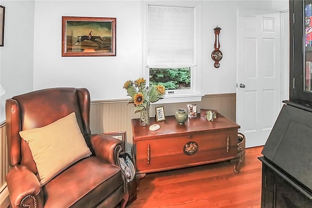60 Tower Hill Rd, Tiverton, RI 02878 - living area featuring a wainscoted wall and wood finished floors