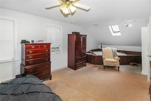60 Tower Hill Rd, Tiverton, RI 02878 - carpeted bedroom with a skylight, a ceiling fan, and lofted ceiling