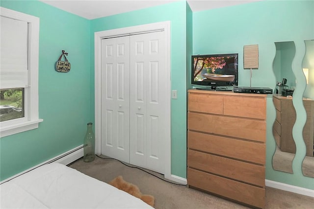 60 Tower Hill Rd, Tiverton, RI 02878 - bedroom with light carpet, a closet, and baseboard heating
