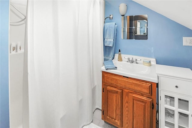 60 Tower Hill Rd, Tiverton, RI 02878 - bathroom with vanity, a shower with shower curtain, and vaulted ceiling