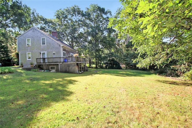 60 Tower Hill Rd, Tiverton, RI 02878 - view of grassy yard featuring a wooden deck and view of wooded area