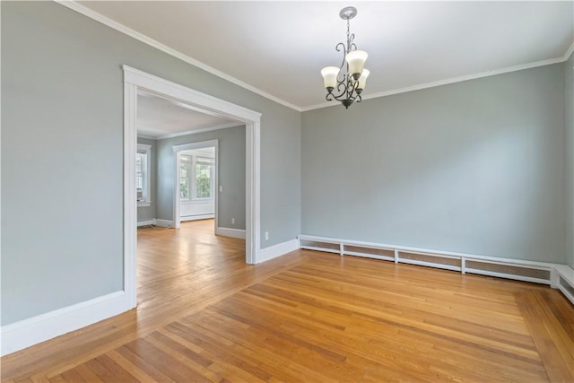 68 Friendly Rd, Cranston, RI 02910 - empty room featuring a chandelier, crown molding, light wood-style flooring, and a baseboard heating unit