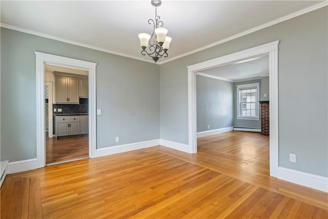 68 Friendly Rd, Cranston, RI 02910 - empty room featuring baseboard heating, light wood-style flooring, a chandelier, and ornamental molding