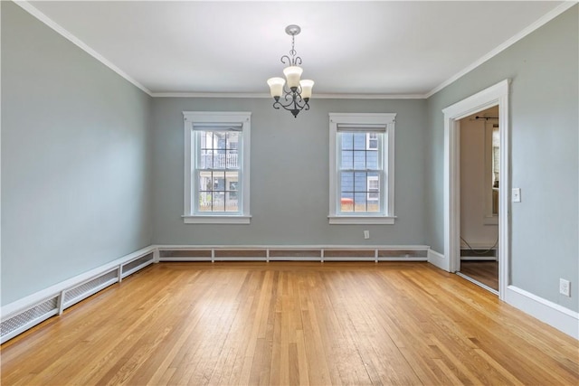68 Friendly Rd, Cranston, RI 02910 - empty room with light wood-type flooring, a chandelier, plenty of natural light, crown molding, and baseboard heating