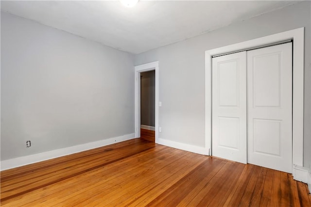 68 Friendly Rd, Cranston, RI 02910 - unfurnished bedroom with a closet and light wood-style flooring
