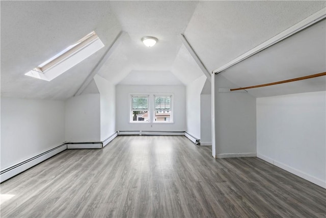68 Friendly Rd, Cranston, RI 02910 - additional living space featuring wood finished floors, a skylight, and lofted ceiling