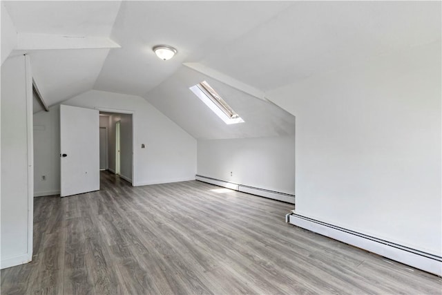 68 Friendly Rd, Cranston, RI 02910 - bonus room with a baseboard heating unit, lofted ceiling, wood finished floors, and a skylight