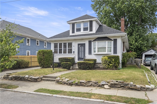 68 Friendly Rd, Cranston, RI 02910 - bungalow-style house with a chimney and a shingled roof