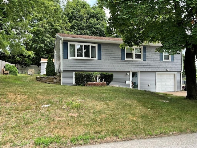 14 Jaycee Dr, West Warwick, RI 02893 - view of front of home with an attached garage and a front yard