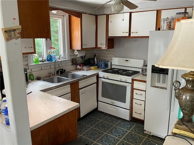 14 Jaycee Dr, West Warwick, RI 02893 - kitchen featuring white appliances, light countertops, tasteful backsplash, ceiling fan, and white cabinets