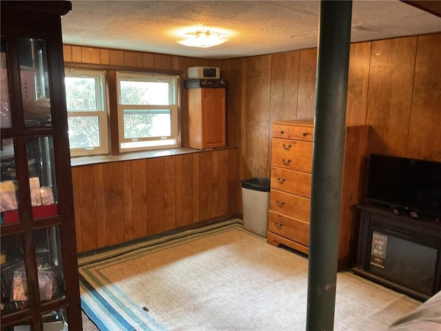 14 Jaycee Dr, West Warwick, RI 02893 - bedroom featuring wood walls and a textured ceiling
