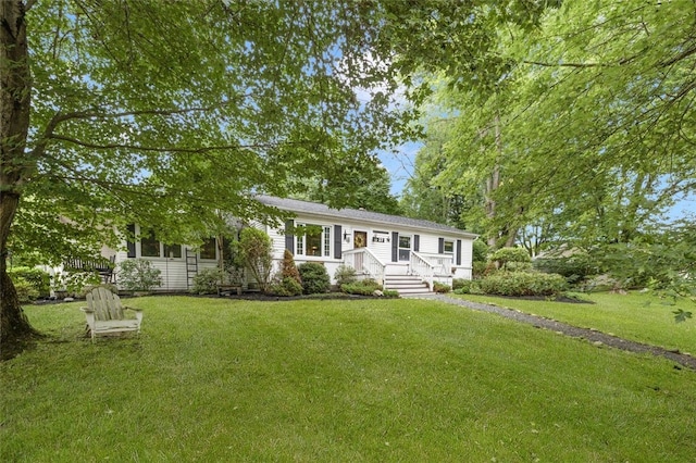 27 Nixon St, Cumberland, RI 02864 - view of front of house featuring a front yard