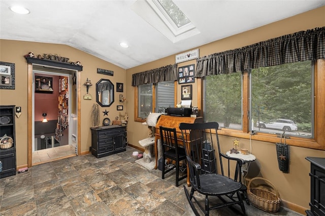 27 Nixon St, Cumberland, RI 02864 - home office featuring a skylight, vaulted ceiling, dark stone finish floors, and recessed lighting