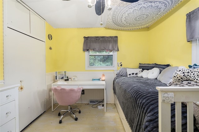 27 Nixon St, Cumberland, RI 02864 - bedroom featuring light wood-style floors and a wainscoted wall