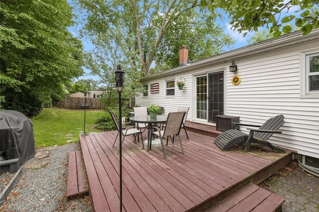 27 Nixon St, Cumberland, RI 02864 - wooden terrace featuring outdoor dining area and a grill