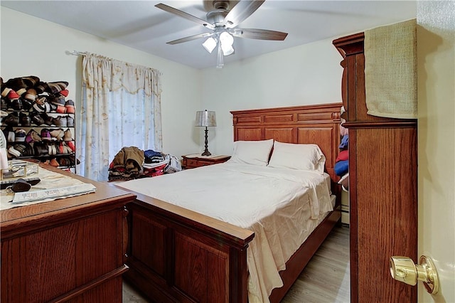 10 E St Unit 316, Cranston, RI 02920 - bedroom featuring light wood-style floors and a ceiling fan