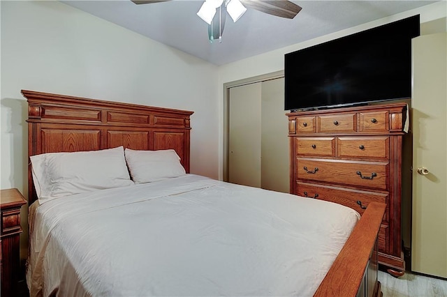 10 E St Unit 316, Cranston, RI 02920 - bedroom featuring a ceiling fan, light wood-style flooring, and a closet