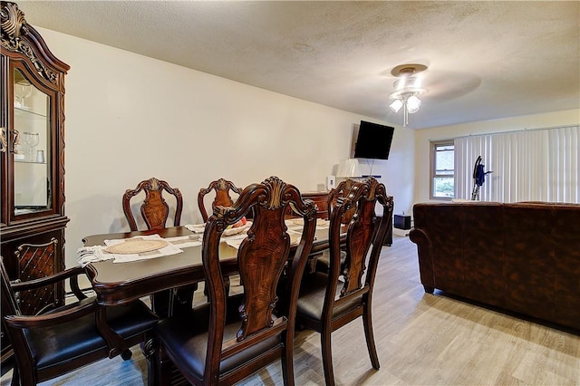 10 E St Unit 316, Cranston, RI 02920 - dining space featuring ceiling fan and light wood-type flooring