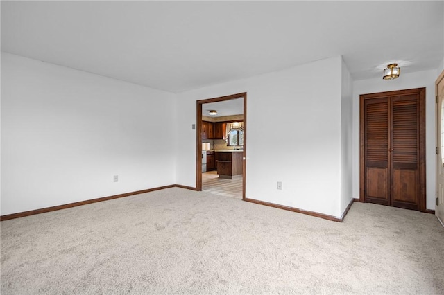 321 Beckwith St, Cranston, RI 02910 - empty room featuring light colored carpet and baseboards