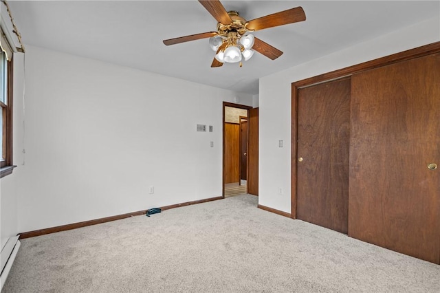 321 Beckwith St, Cranston, RI 02910 - unfurnished bedroom featuring carpet flooring, a closet, ceiling fan, and baseboard heating