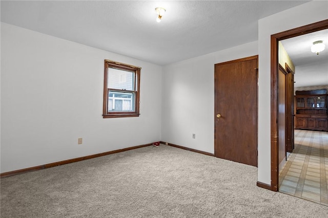 321 Beckwith St, Cranston, RI 02910 - empty room featuring light carpet and baseboards