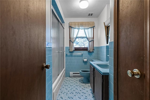 321 Beckwith St, Cranston, RI 02910 - full bathroom with a baseboard radiator, tile walls, vanity, a wainscoted wall, and combined bath / shower with glass door