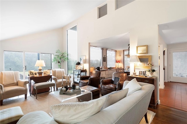 668 Indian Ave, Middletown, RI 02842 - living area featuring high vaulted ceiling and wood finished floors