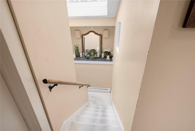 668 Indian Ave, Middletown, RI 02842 - stairs featuring a skylight and a baseboard heating unit