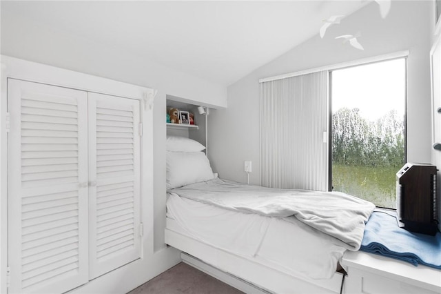 668 Indian Ave, Middletown, RI 02842 - carpeted bedroom featuring lofted ceiling and access to outside