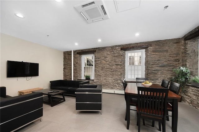 65 Weybosset St Unit 211, Providence, RI 02903 - living room with a baseboard heating unit and recessed lighting