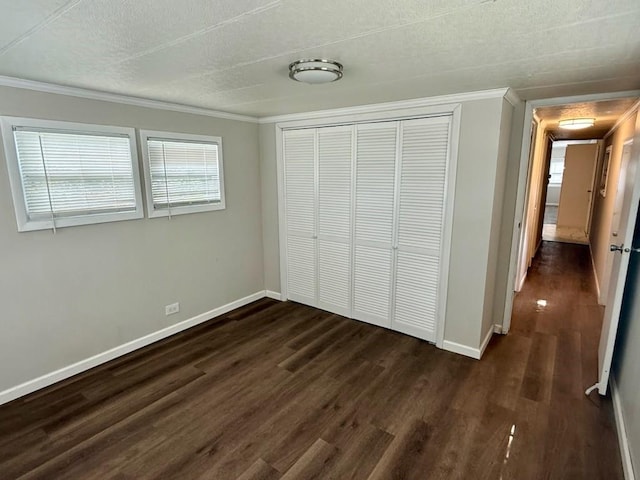 4 Lane B Ln, Coventry, RI 02816 - unfurnished bedroom with dark wood-type flooring, ornamental molding, a closet, and a textured ceiling