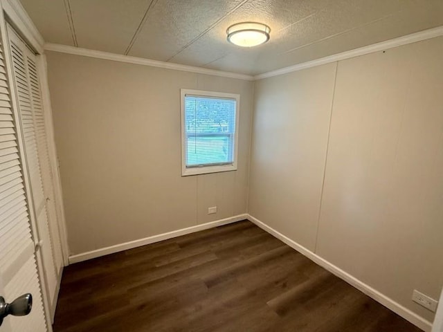 4 Lane B Ln, Coventry, RI 02816 - unfurnished bedroom featuring dark wood-type flooring, a closet, and crown molding