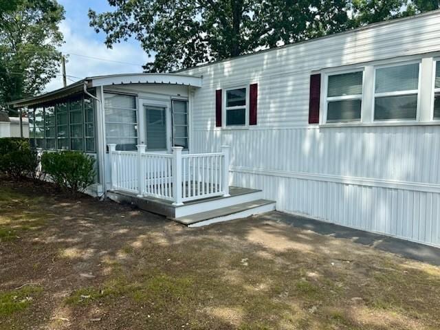 4 Lane B Ln, Coventry, RI 02816 - back of house featuring a sunroom