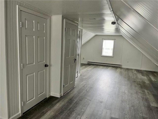 74 Leslie St, Cranston, RI 02910 - additional living space with a baseboard heating unit, dark wood finished floors, and vaulted ceiling