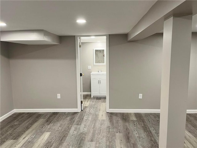 74 Leslie St, Cranston, RI 02910 - finished below grade area featuring wood finished floors and recessed lighting