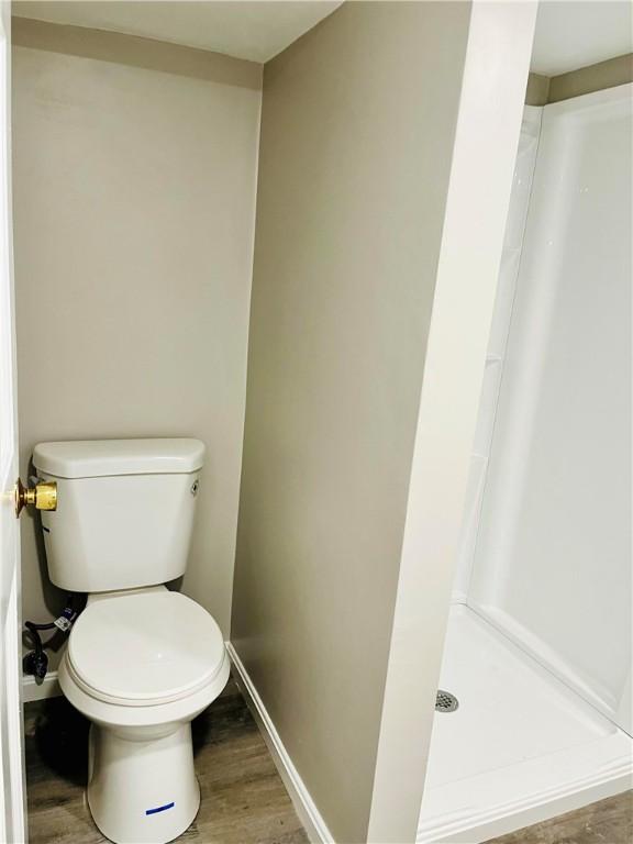 74 Leslie St, Cranston, RI 02910 - bathroom featuring wood finished floors and a stall shower