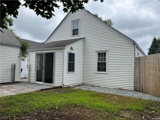 74 Leslie St, Cranston, RI 02910 - rear view of property with a patio area