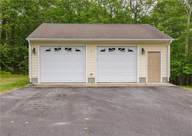 1846 E Wallum Lake Rd, Burrillville, RI 02859 - detached garage featuring view of scattered trees