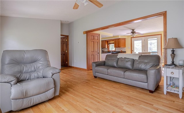 1846 E Wallum Lake Rd, Burrillville, RI 02859 - living area with a ceiling fan and light wood finished floors